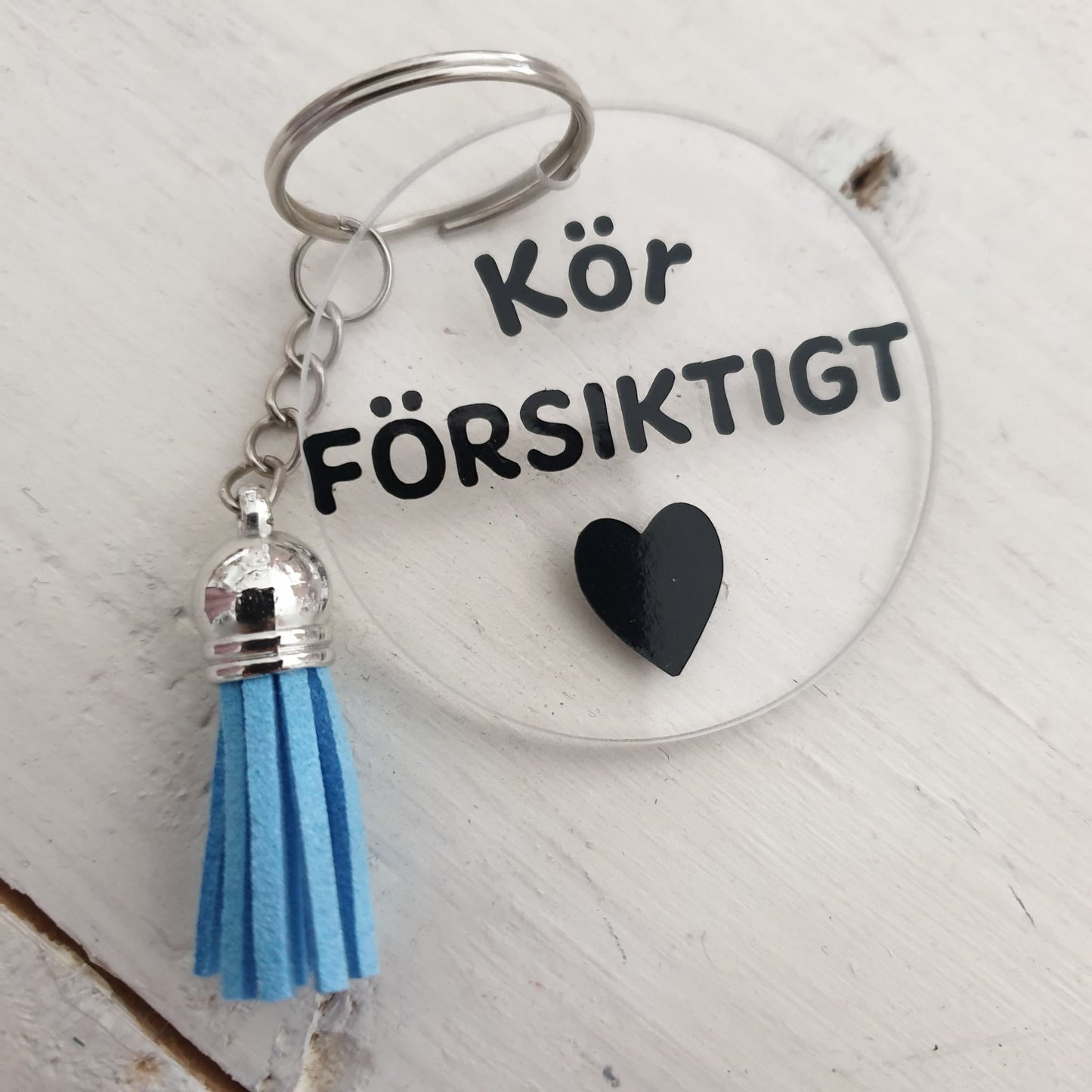 Nyckelring-Kör försiktigt